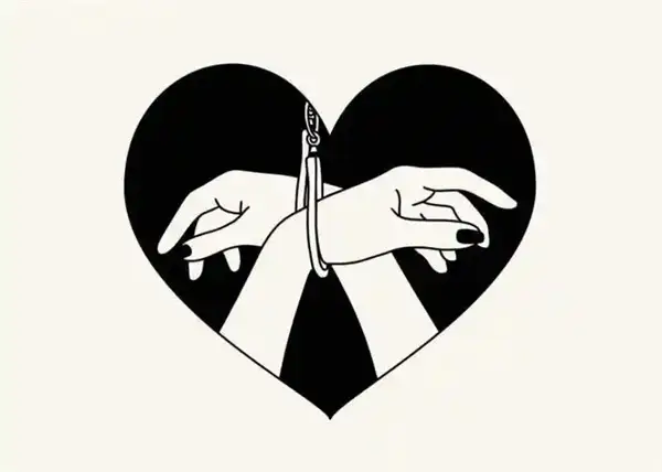 Hands in handcuffs in heart BDSM themes