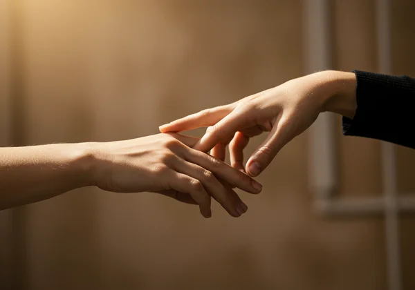 Handen die verbinding maken, symboliseren vertrouwen, toestemming en communicatie