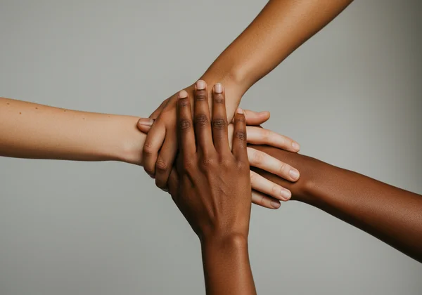 Three hands forming a triangle, symbolizing SSC principles.